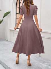 Textured Puff Short Sleeve Ruched Midi A-Line Dress Raised Fabric Cinched Waist and Casual-Chic Design