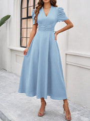 Textured Puff Short Sleeve Ruched Midi A-Line Dress Raised Fabric Cinched Waist and Casual-Chic Design