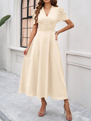 Textured Puff Short Sleeve Ruched Midi A-Line Dress Raised Fabric Cinched Waist and Casual-Chic Design