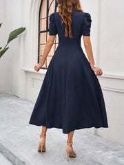 Textured Puff Short Sleeve Ruched Midi A-Line Dress Raised Fabric Cinched Waist and Casual-Chic Design