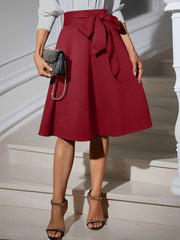 Solid Color Tie Waist Bowknot Midi A-Line Skirt