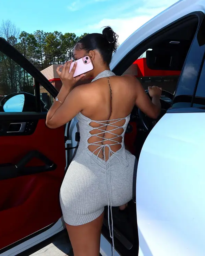 Deep V-Neck Halter-Neck Backless Jumpsuit With Drawstring Detail.